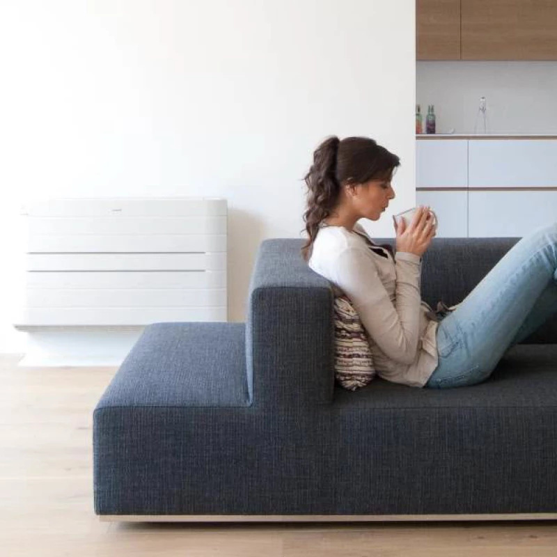 Woman enjoying air conditioned home in South West WA.